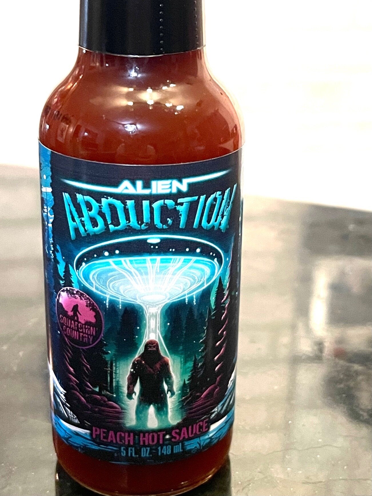 Abduction Peach Hot Sauce from Squatchin' Country