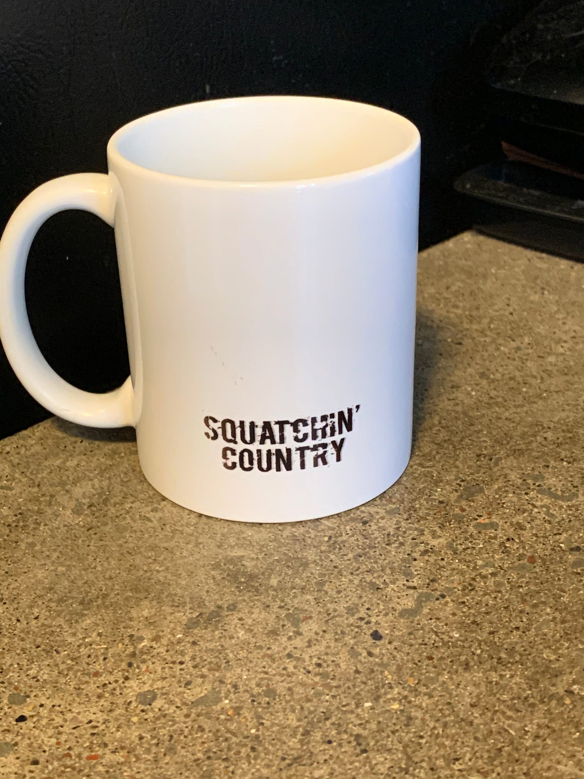 Squatchin' Country campfire sasquatch coffee mug