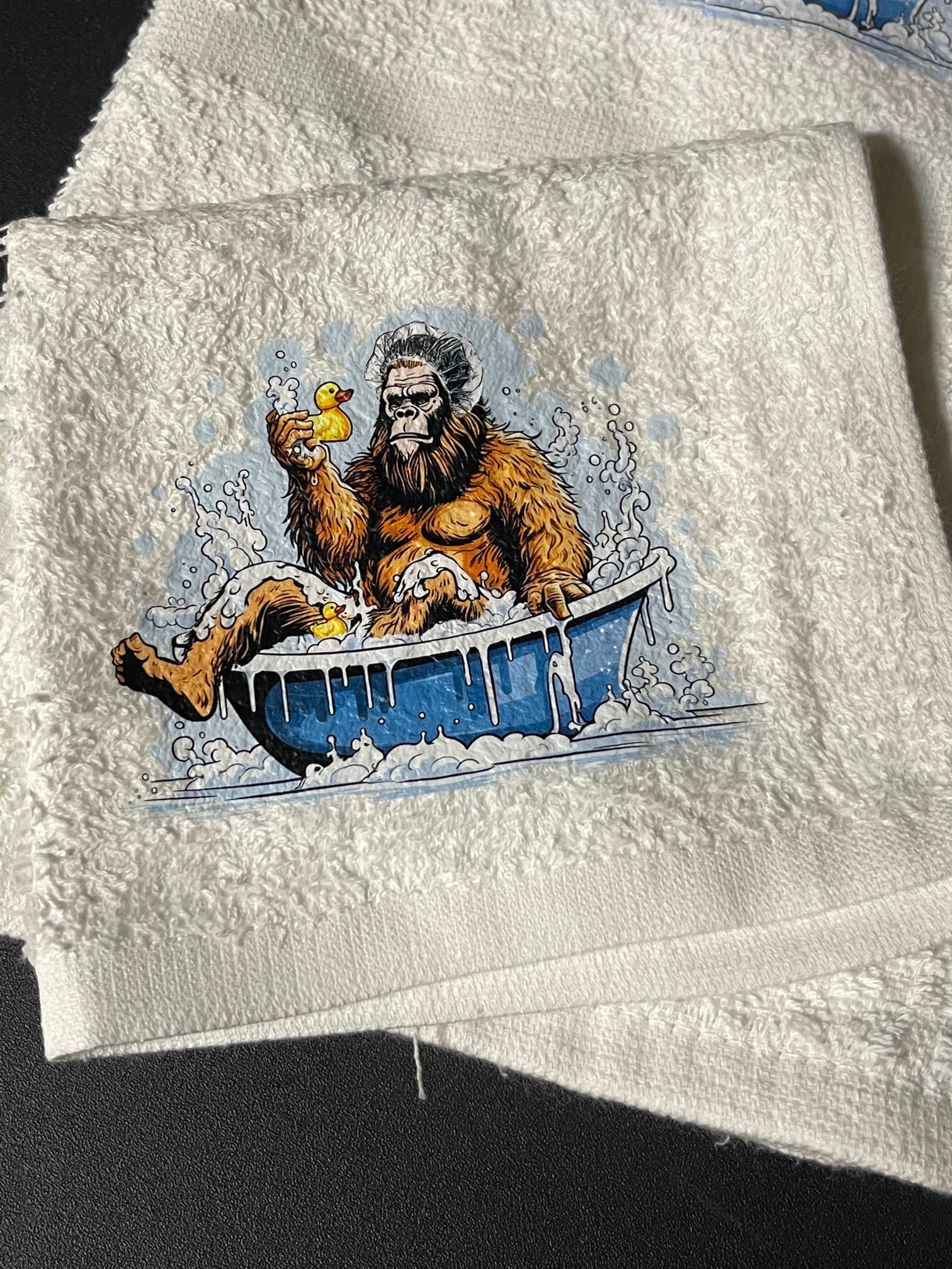 Bathing Bigfoot and rubber ducky wash rag, hand towel, bath towel