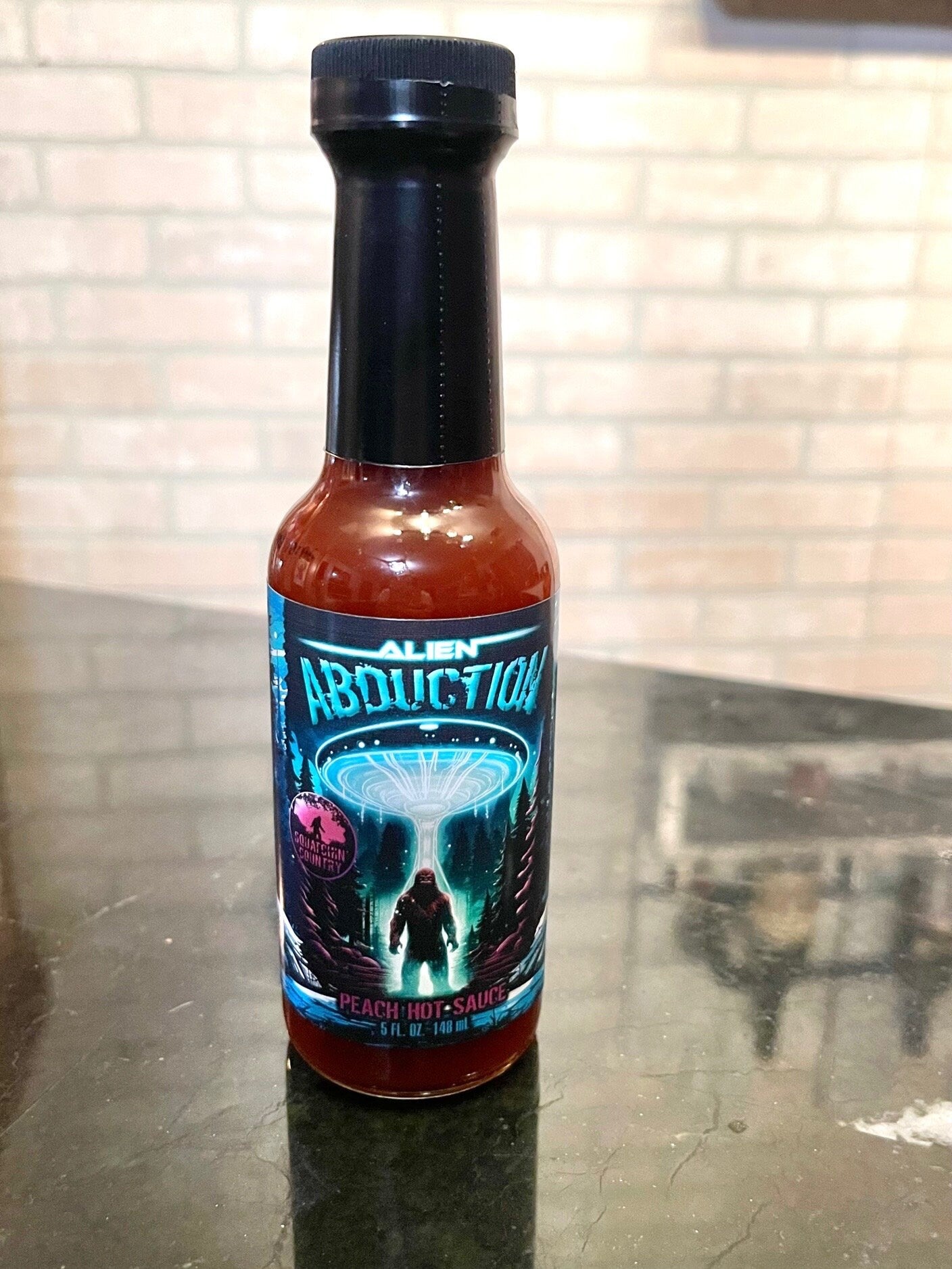 Abduction Peach Hot Sauce from Squatchin' Country