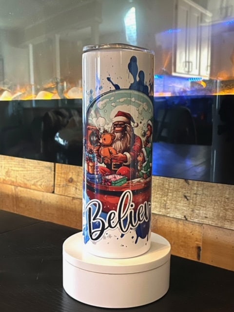 Santa Sasquatch Snow Globe winter scene 20oz tumbler - Believe